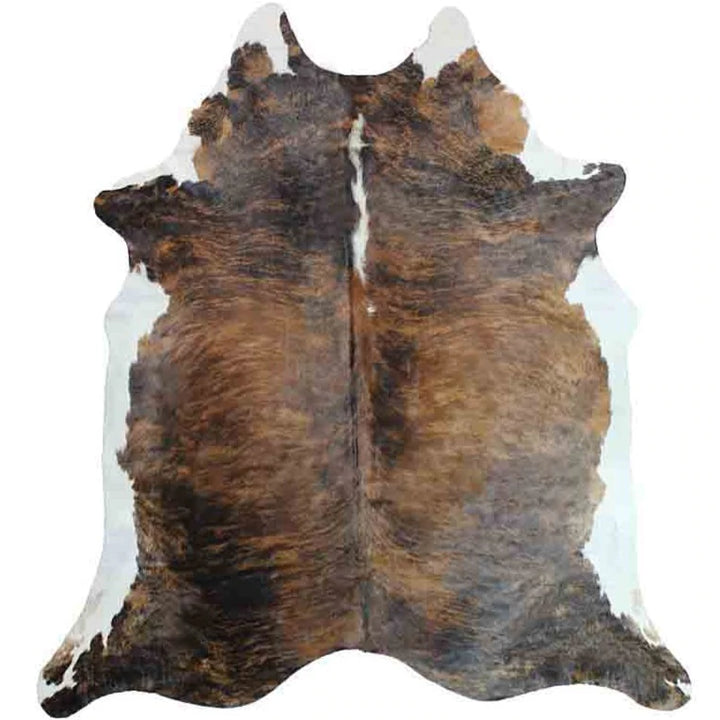 Brindle cowhide with white belly - The Coastal Compass Home Decor