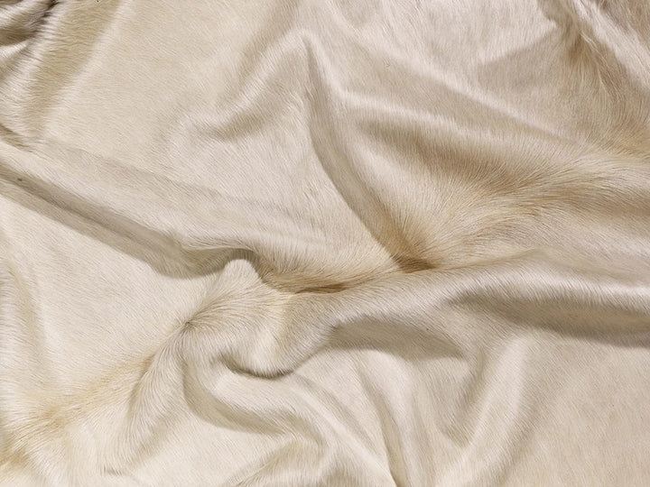 Champagne cowhide detail - Coastal Compass Home Decor