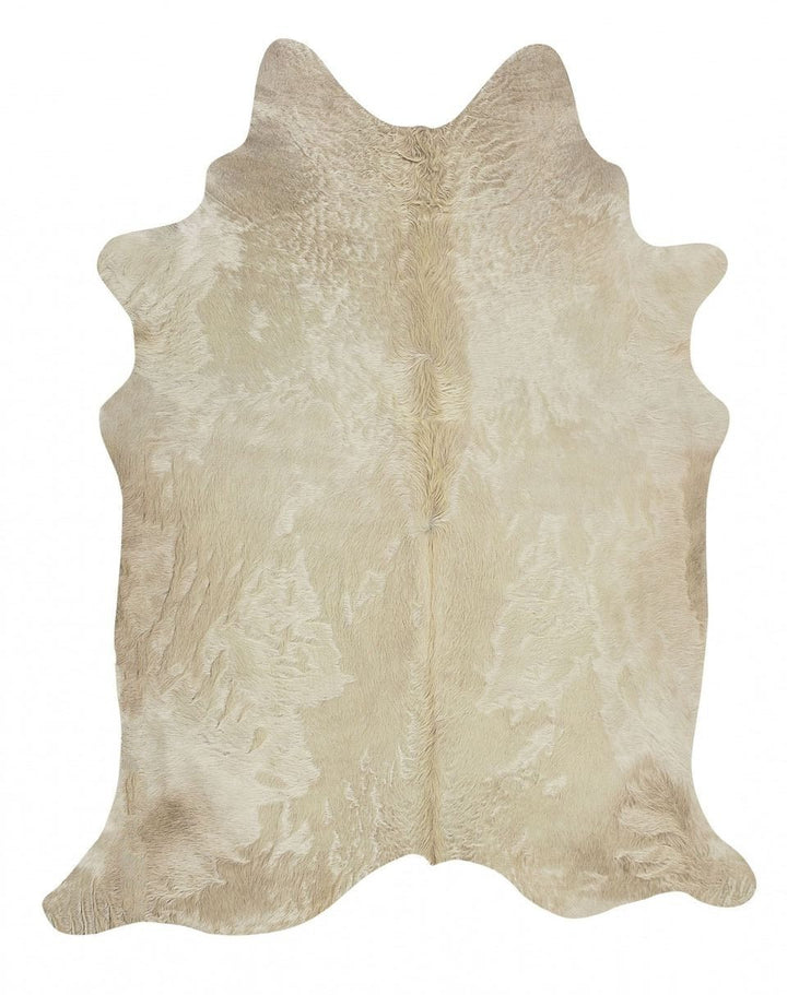 Champagne Cowhide Rug - The Coastal Compass Home Decor