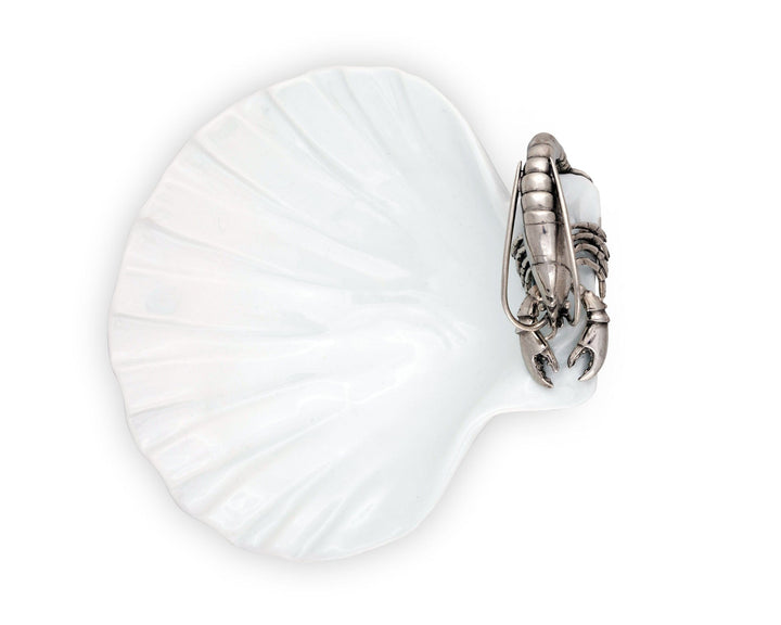 Pewter shrimp with intricate design on a white shell