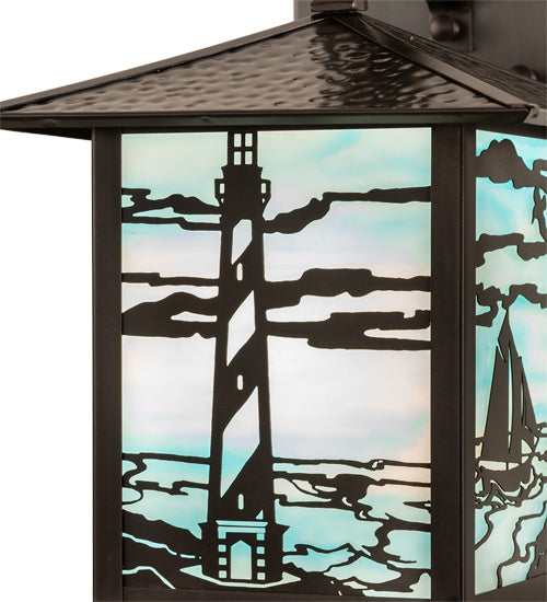 American made Coastal Nautical Lighting Wall Sconce in sky blue art glass with lighthouse and sailboat on the blue sea - Coastal Compass Home Decor