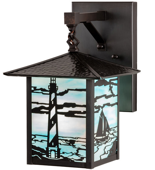 American made Coastal Nautical Lighting Wall Sconce in sky blue art glass with lighthouse and sailboat on the blue sea - Coastal Compass Home Decor