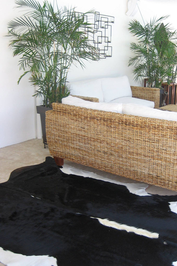 Black and white cowhide rug - The Coastal Compass Home Decor