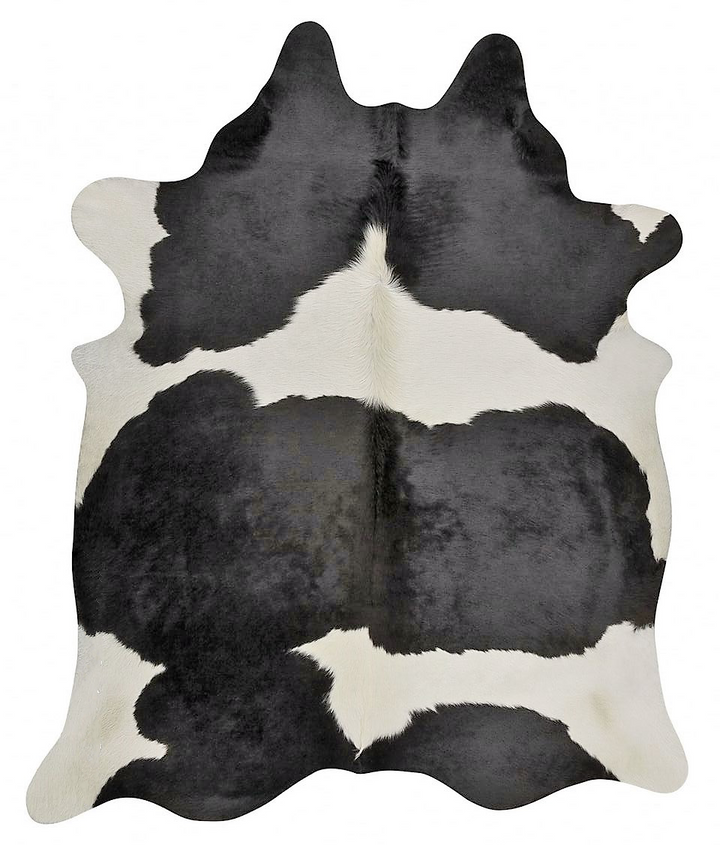 Brazilian black and white cowhide rug - The Coastal Compass Home Decor