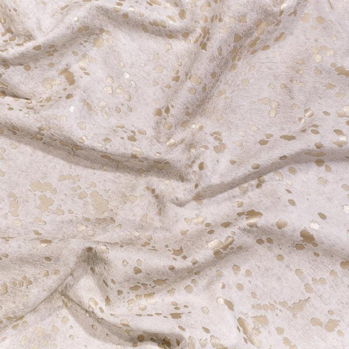 Acid wash ivory cowhide with matte gold speck - The Coastal Compass Home Decor