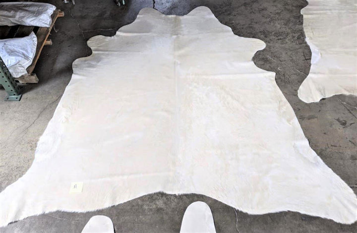 Ivory off-white premium Brazilian cowhide rug - The Coastal Compass Home Decor