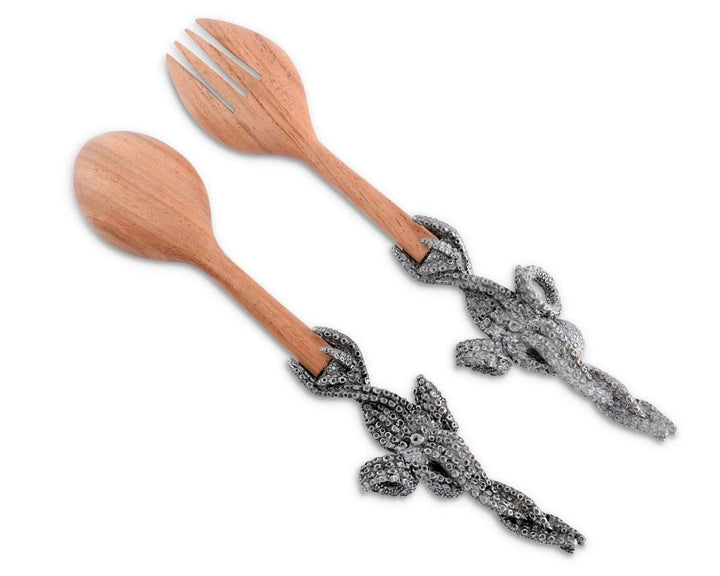 Detailed pewter octopus handles on acacia wood salad utensil serving set. Coastal Compass Octopus Decor.