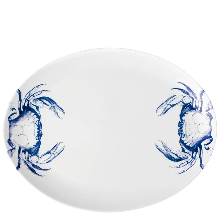 Blue crabs on white pocelain oval serving platter. Coastal Compass Home Decor