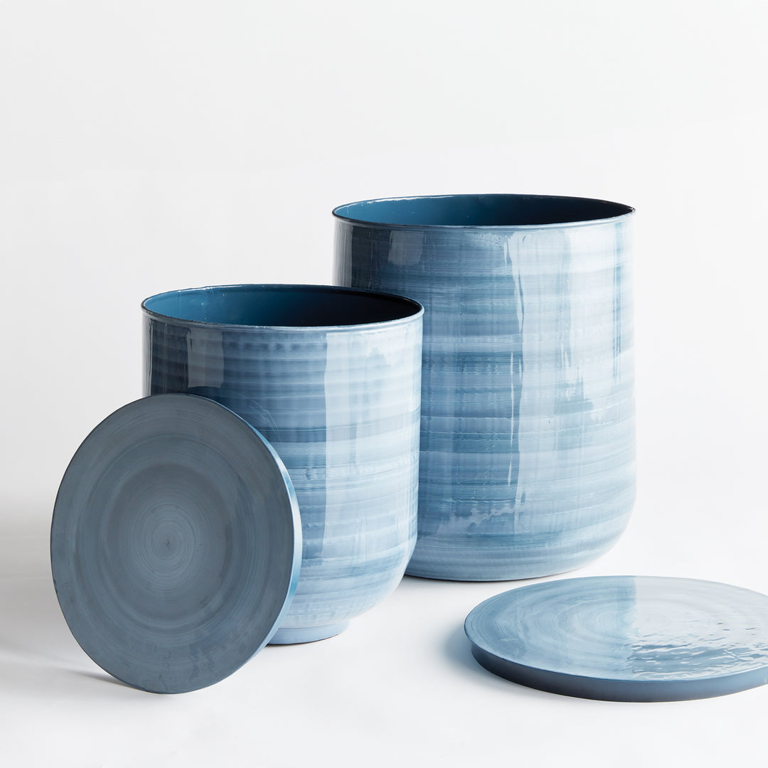 Coastal blue gray drum tables with removable lids revealing hidden storage, modern coastal accent furniture set