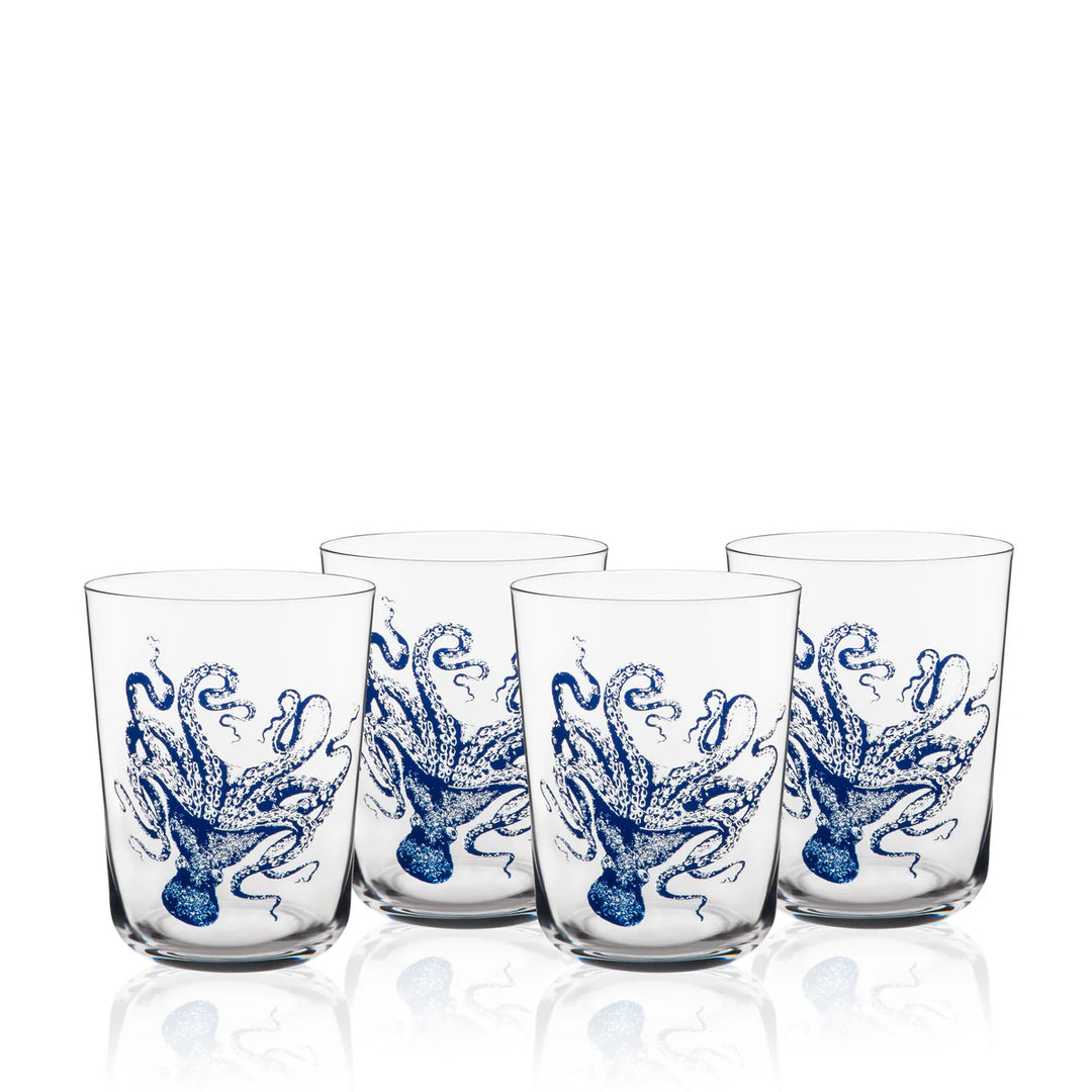 Set of four glass tumblers with blue octopus design on a white background