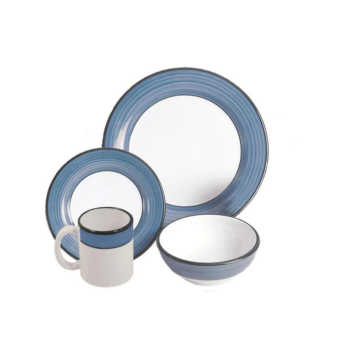 Ceramic dinnerware set with blue rim on a white background