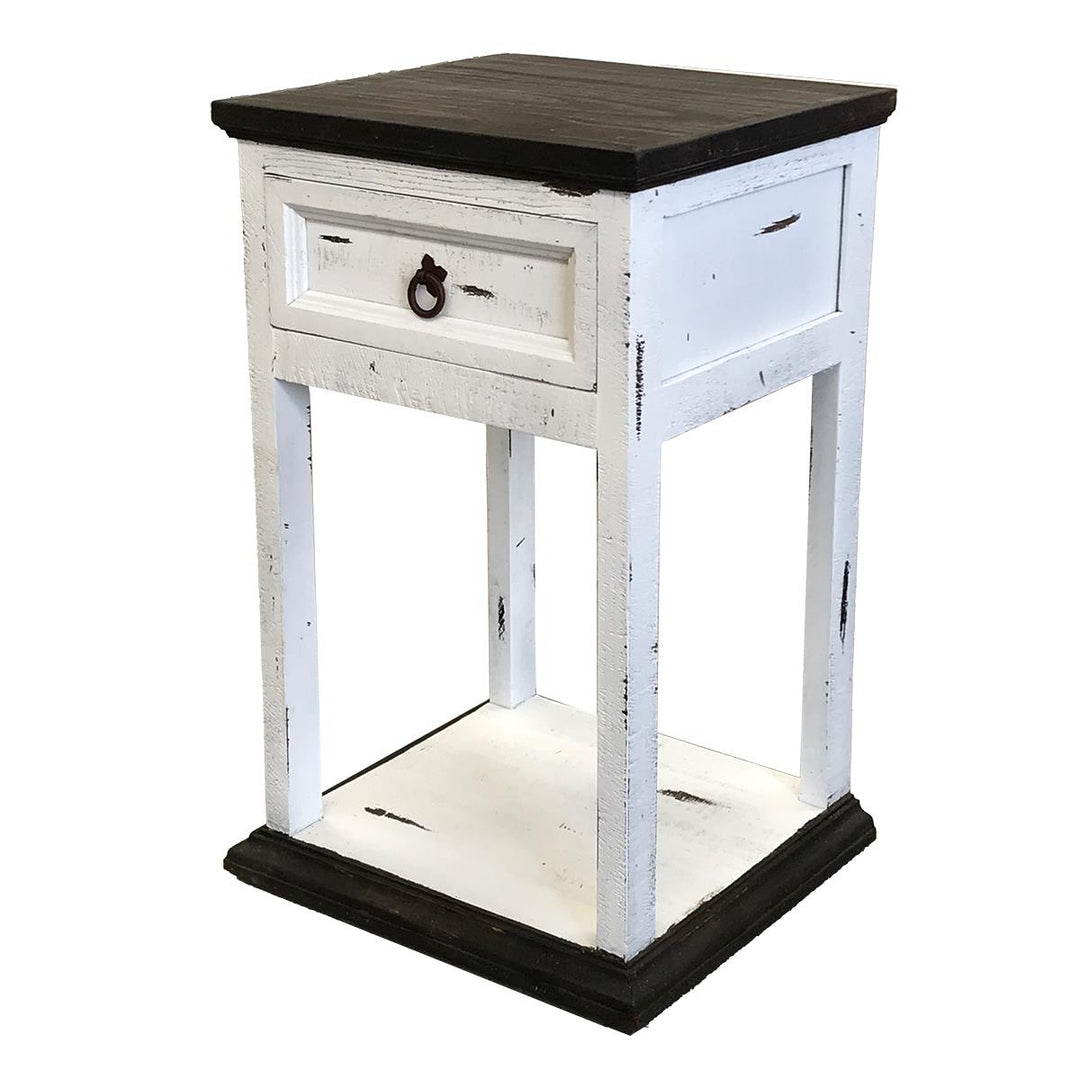 Small wooden side table with a white distressed finish and black top on a white background