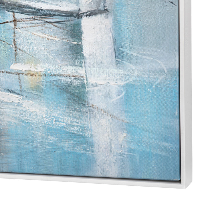 Abstract art piece with blue and white colors on a white background. Coastal Compass Home Deocr