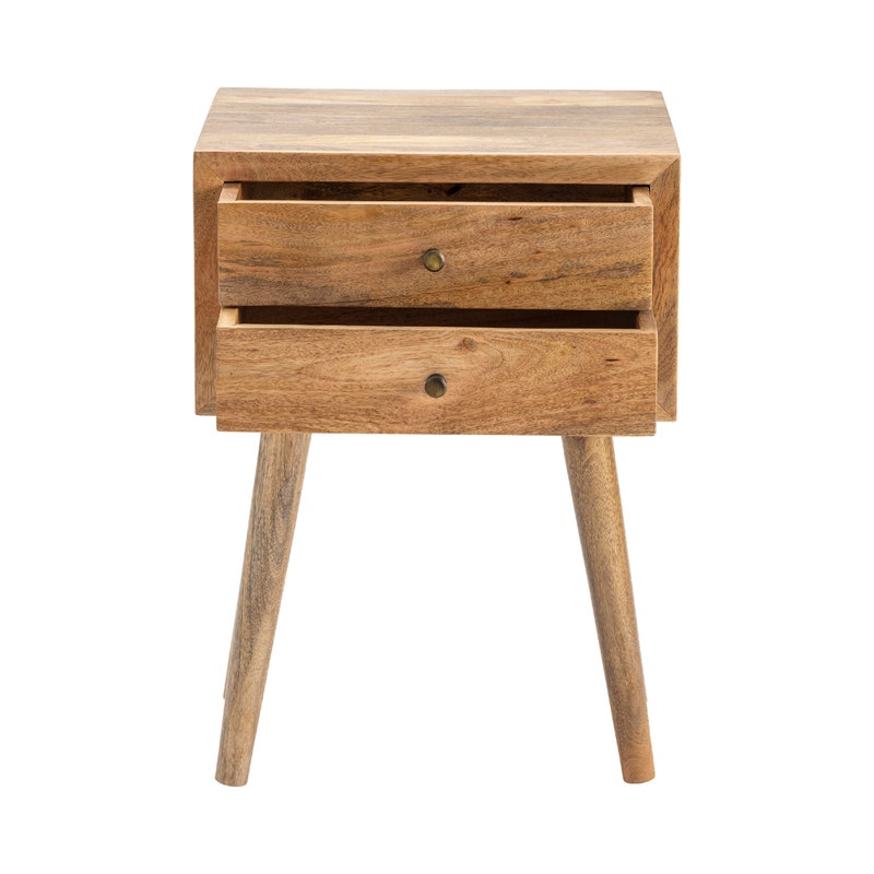 Wooden side table with two drawers with round gold drawer pulls on a white background