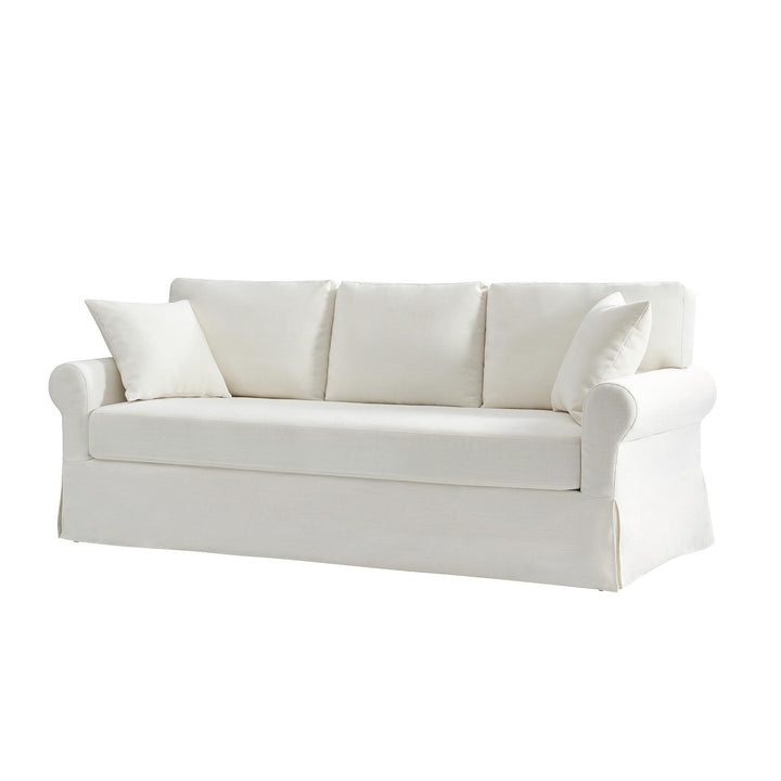 Front view of white ivory slipcovered sofa with three back cushions and bench seat - Whitehaven sofa