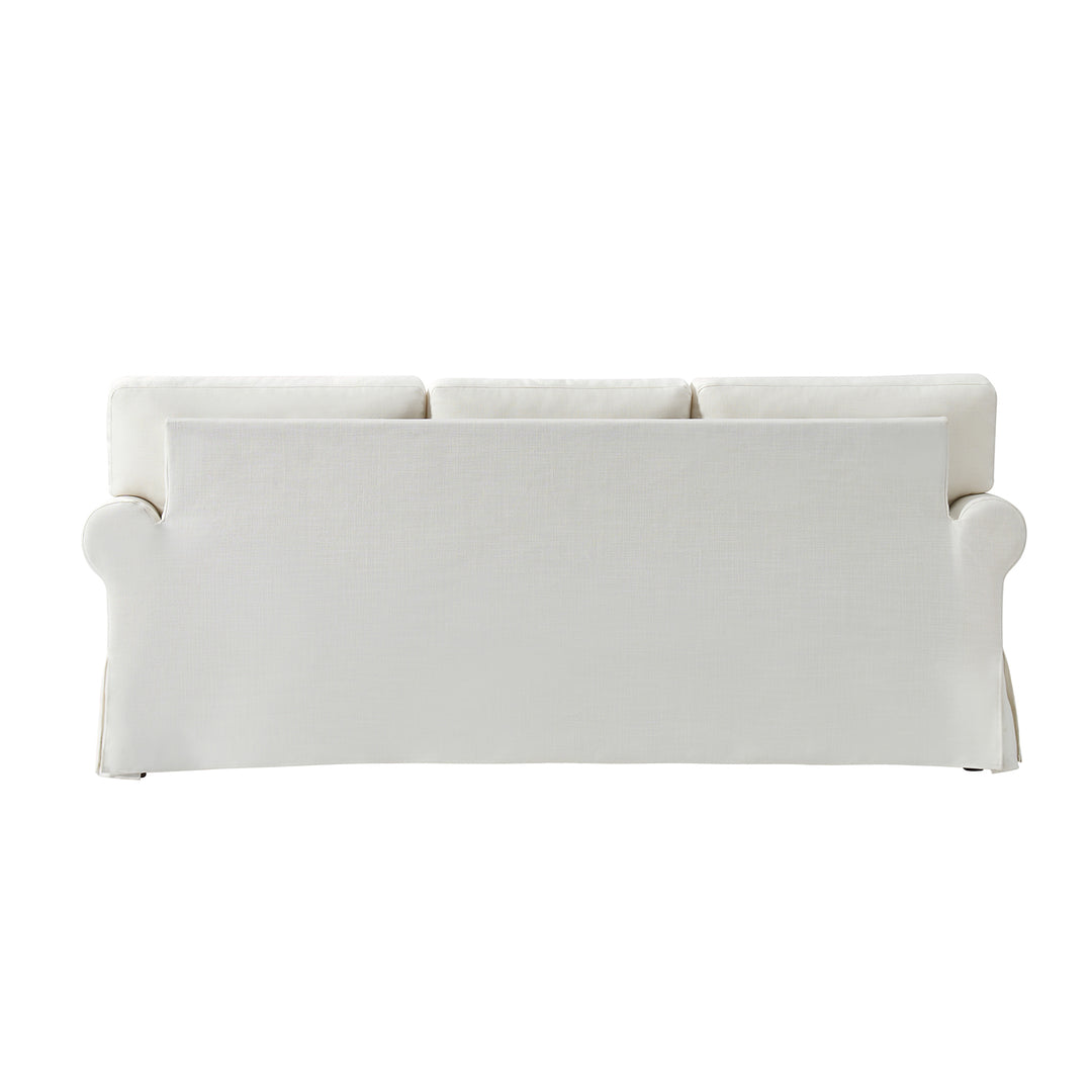Back view of white slipcovered sofa with tailored linen cover and clean lines - Whitehaven sofa