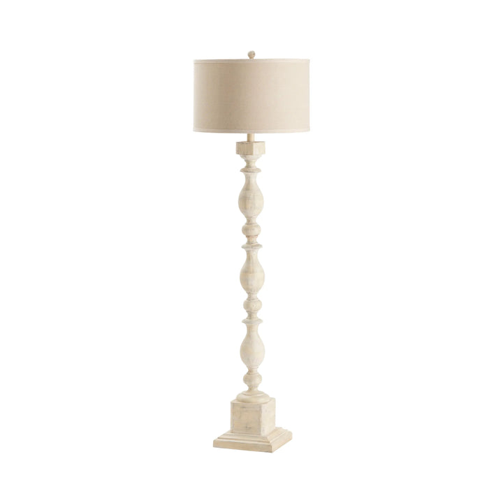 White floor lamp with a beige lampshade on a white background