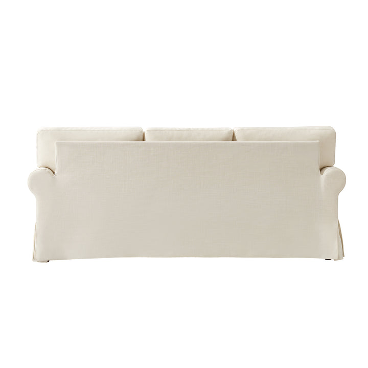 Back view of white slipcovered sofa with tailored linen cover and clean lines - Whitehaven sofa