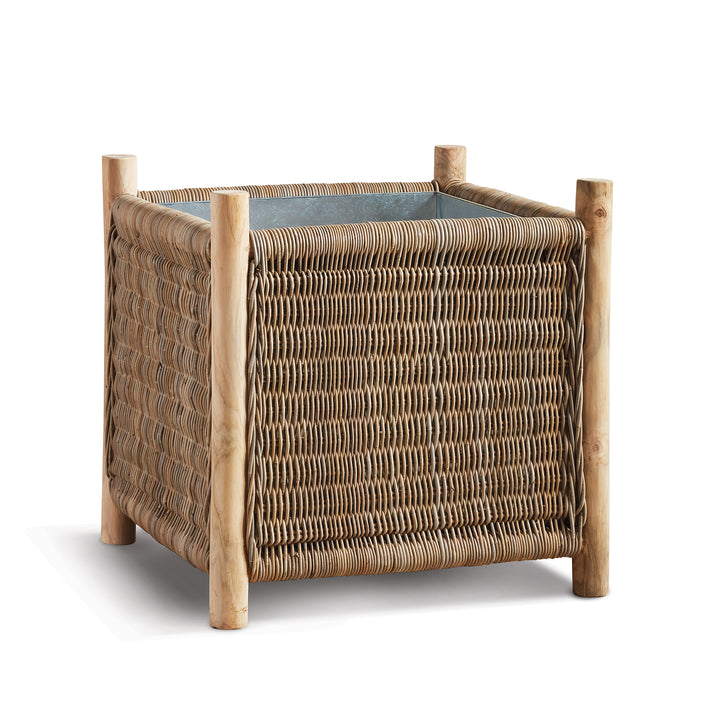 London Grand woven rattan planter with solid teak legs and square silhouette
