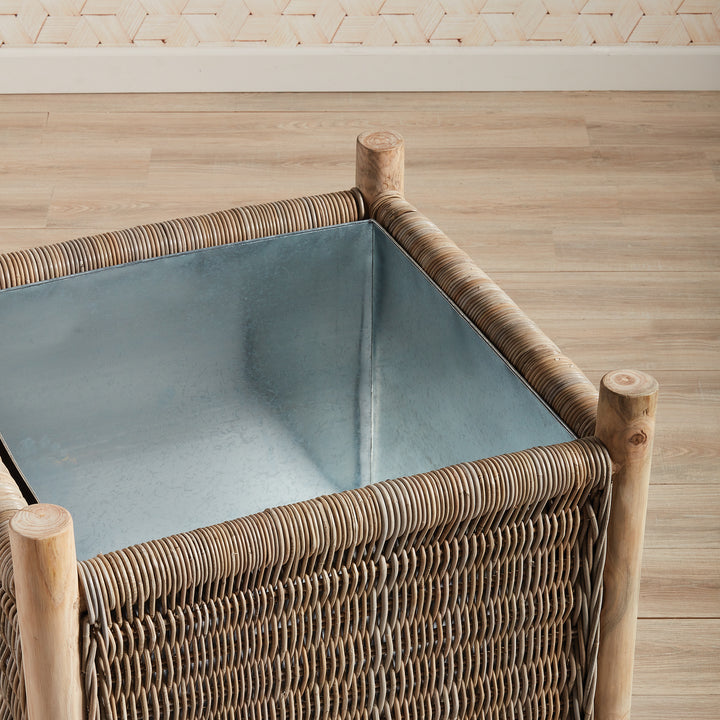 Interior view of London Grand rattan planter showing removable galvanized zinc liner and teak corner posts
