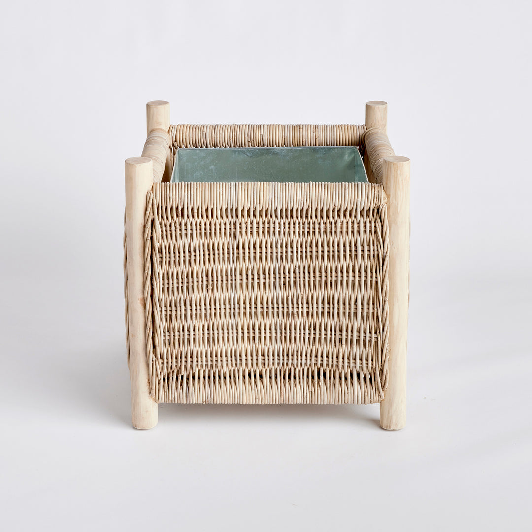 London Medium coastal rattan planter with teak legs and square woven design