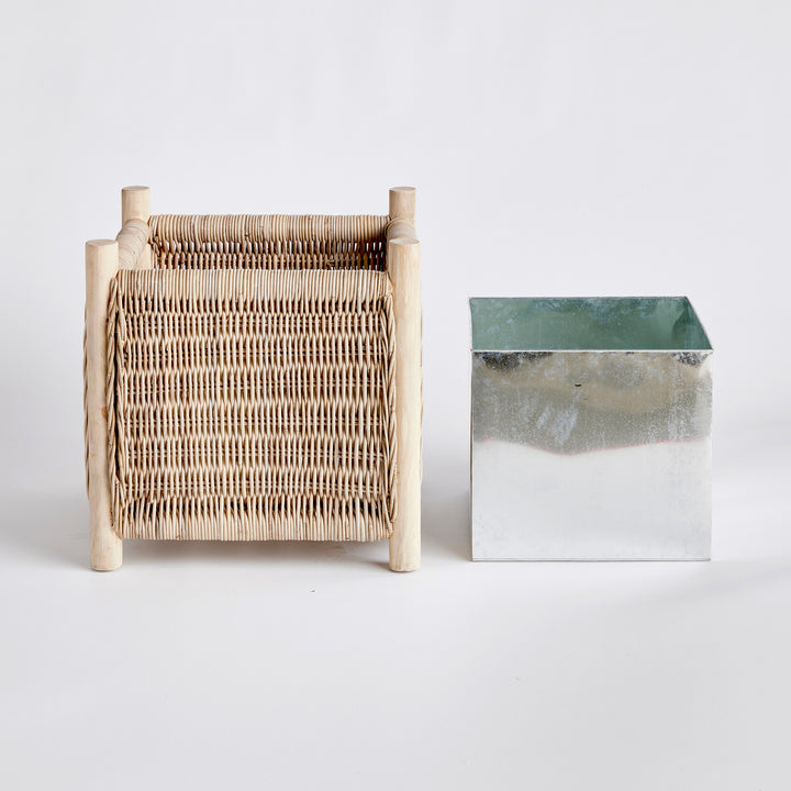 London Medium woven rattan planter with zinc liner removed beside planter base