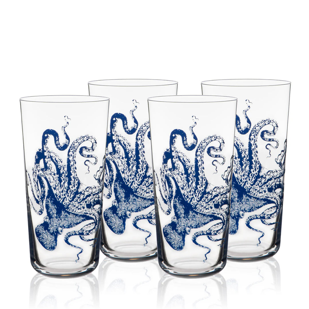 Four glass tumblers with blue octopus designs on a white background