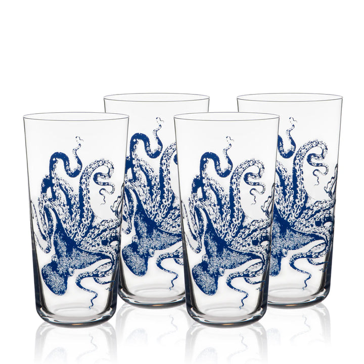 Four glass tumblers with blue octopus designs on a white background