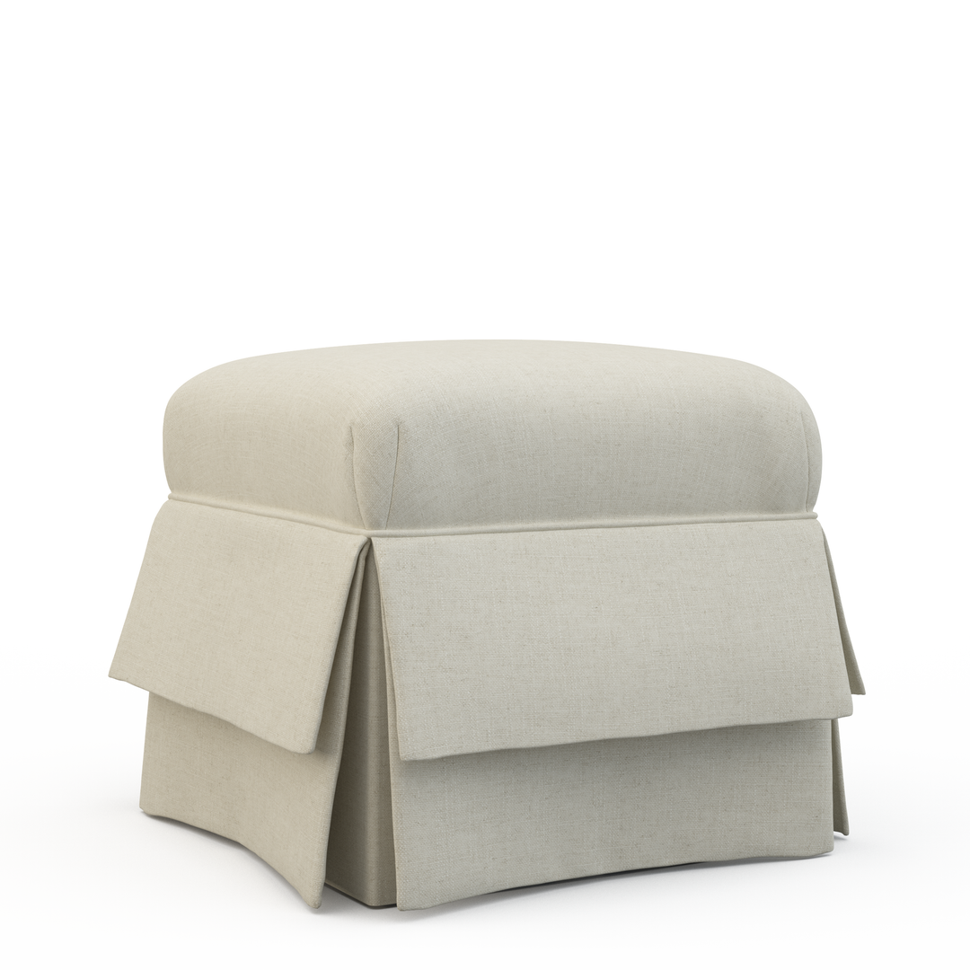 Beige ottoman with a pleated skirt on a white background