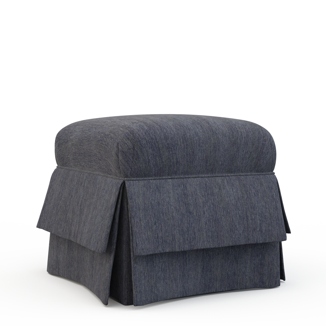 Dark blue ottoman with a pleated skirt on a white background