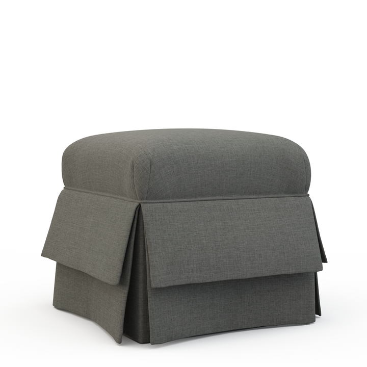 Gray ottoman with a skirted design on a white background