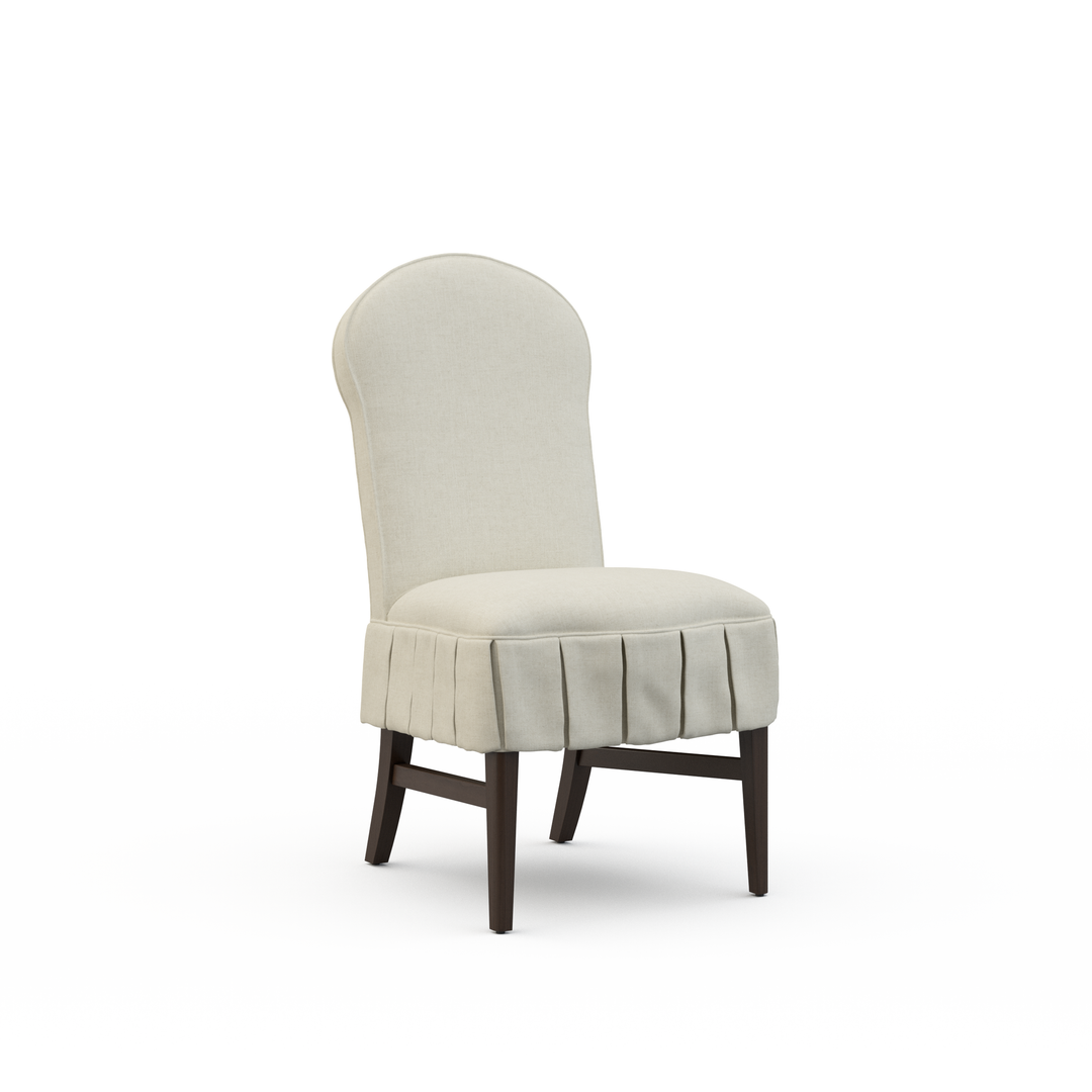 Beige upholstered chair with a skirt on a white background