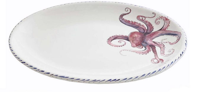 Decorative plate with an octopus design on a white background