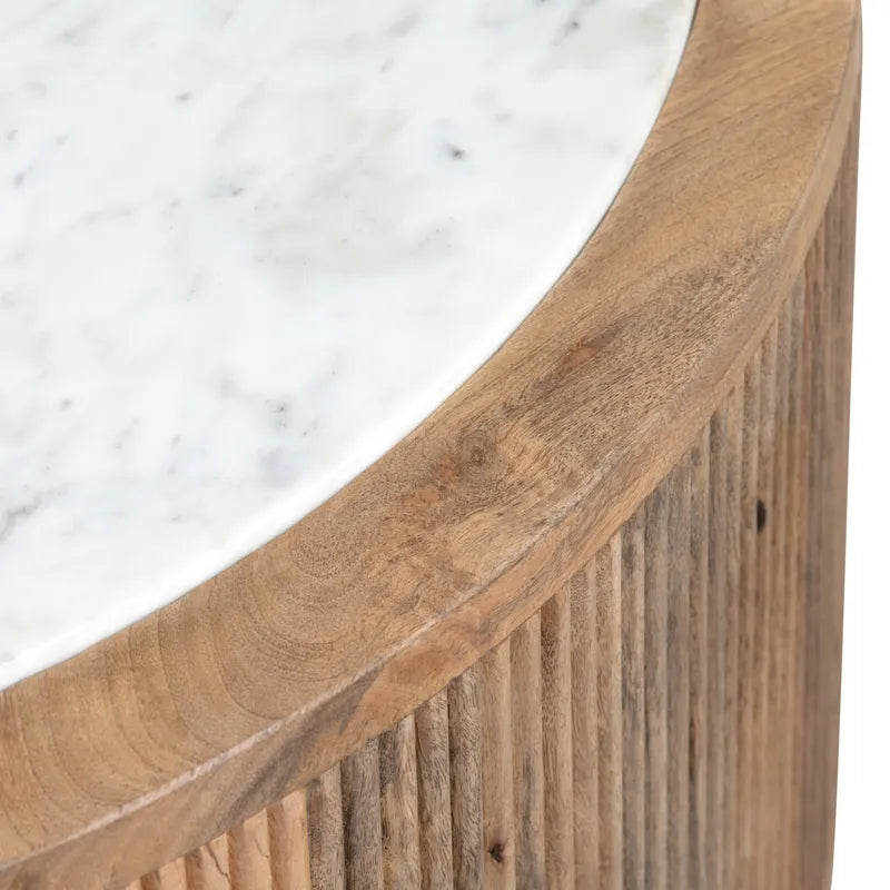Close-up of a wooden chair with a marble background