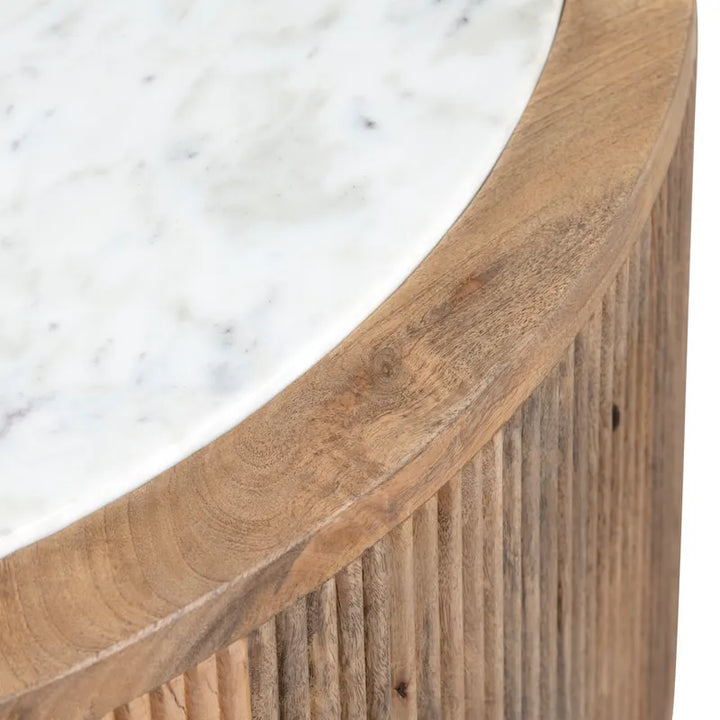 Close-up of a wooden chair with a marble background