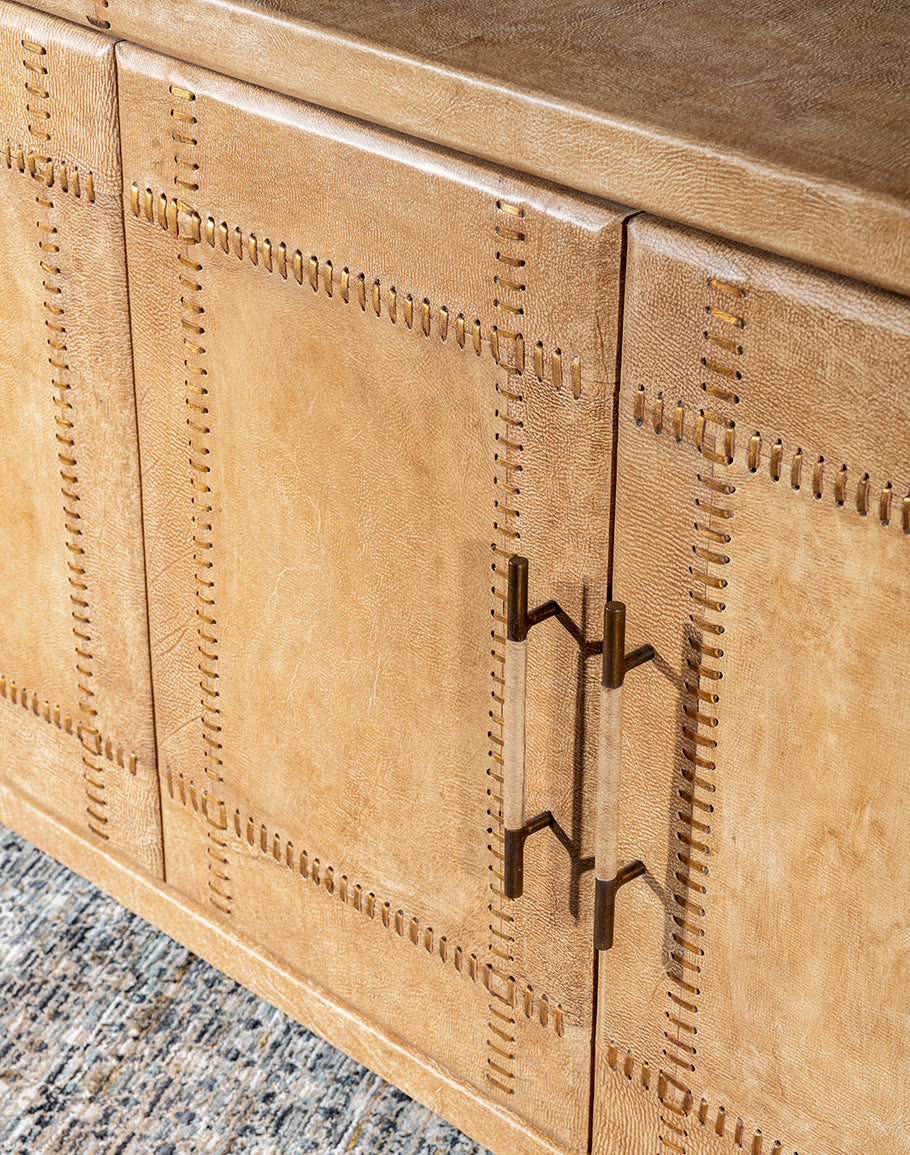 Sand Leather buffet - curved corners - palomino tan leather - brass leather wrapped handles - large stitching - coastal compass home decor