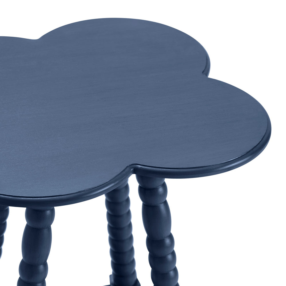 Navy blue side table with scalloped edges on a white background
