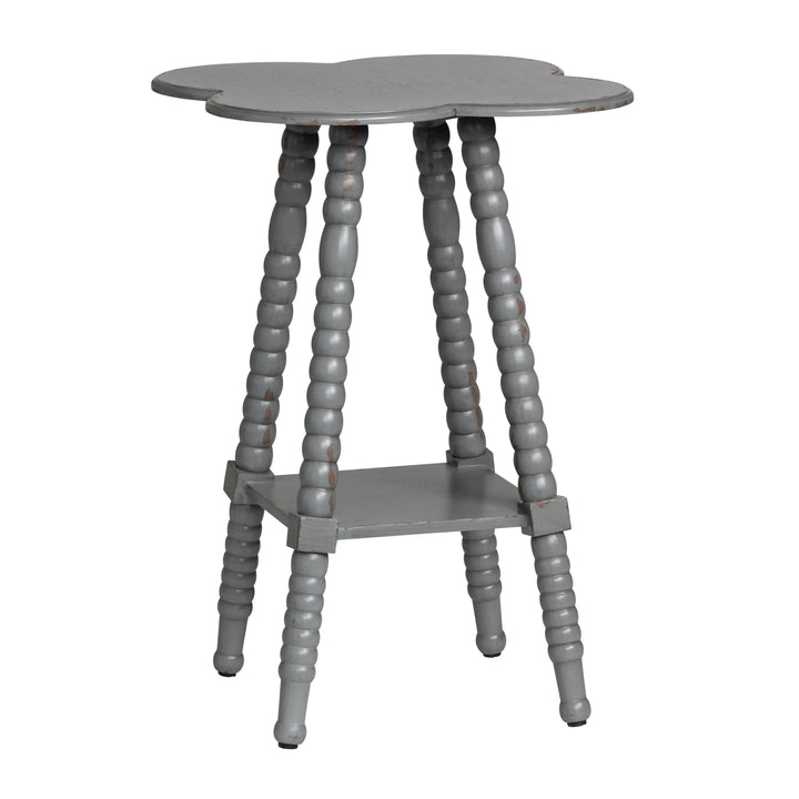 Gray side table with scalloped edges and spiral legs on a white background