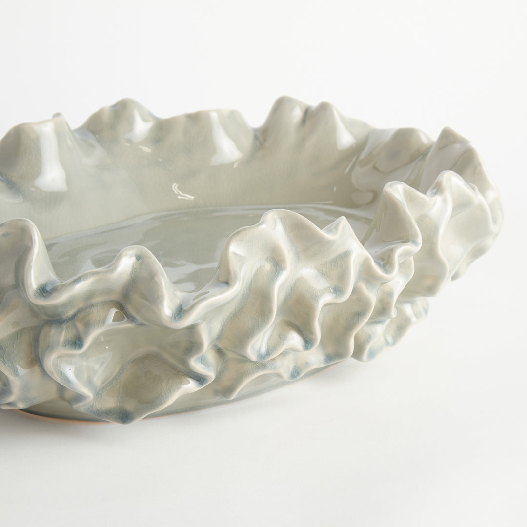 Small white sea life decorative shell bowl in glazed stoneware