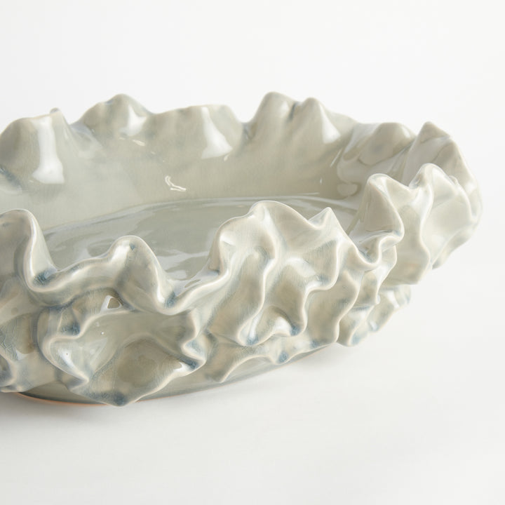 Small white sea life decorative shell bowl in glazed stoneware