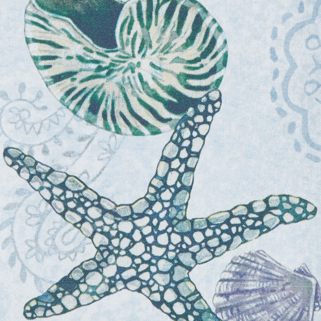 Decorative towel design with starfish, shell, and nautilus on a light blue background