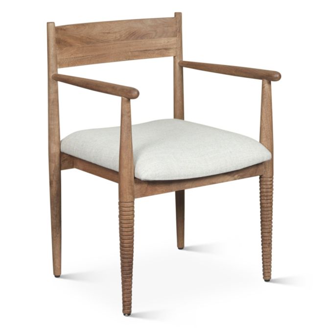 Shoreline spindle dining chair with natural wood frame, linen upholstered seat, and ribbed front legs