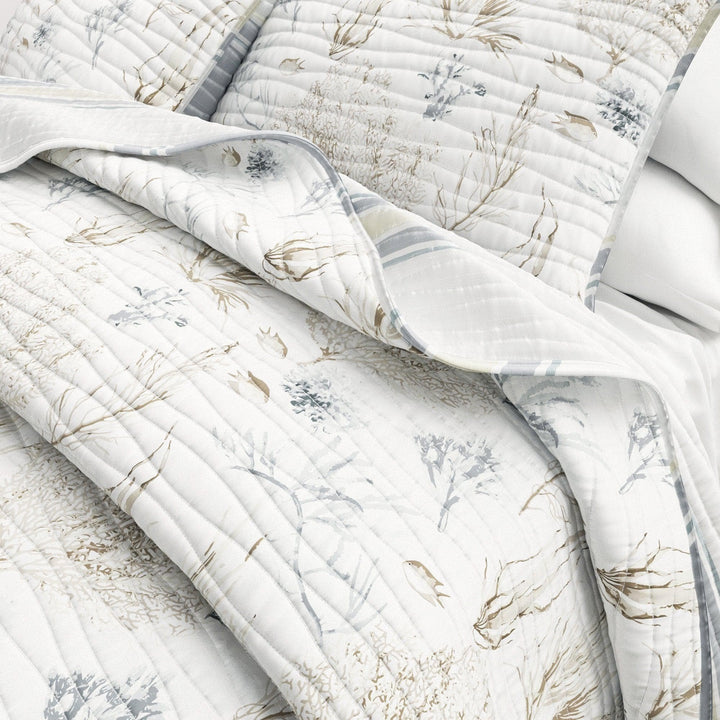 Shoreline Meadows Quilt with coastal floral neutral pattern