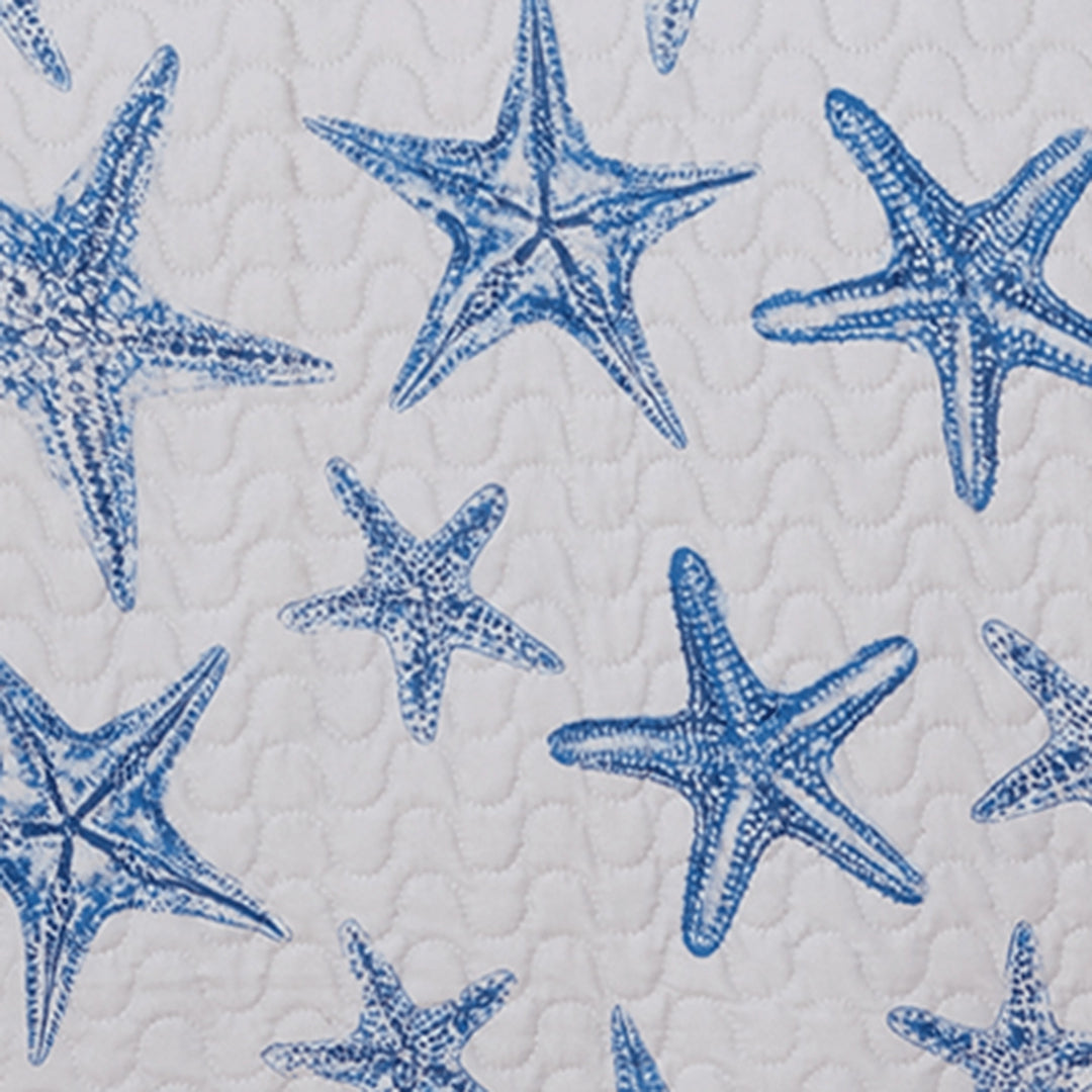 Pattern of blue starfish on a textured white background