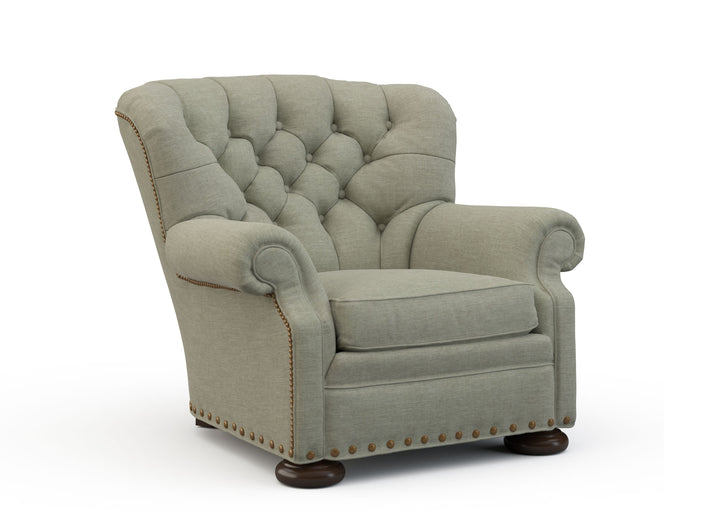 Taupe armchair with tufted backrest on a white background