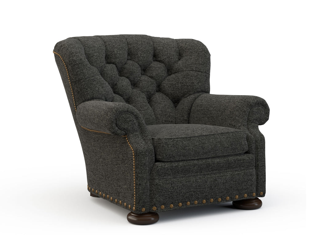 Dark Gray upholstered armchair with tufted backrest on a white background