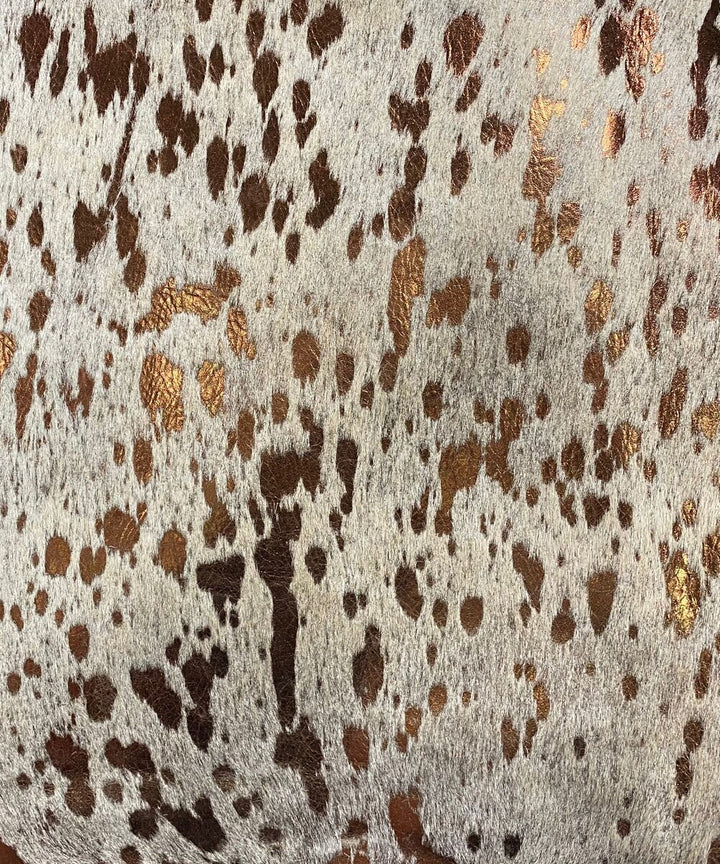 Metallic gold on beige cowhide sample - Coastal Compass Home Decor