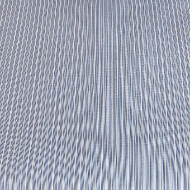 Close-up of blue and white striped fabric texture