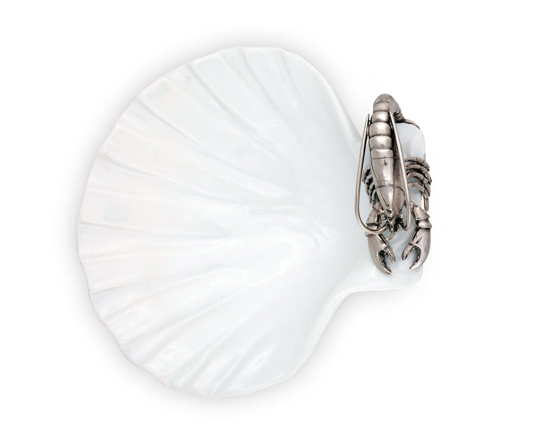 Pewter shrimp with intricate design on a white shell