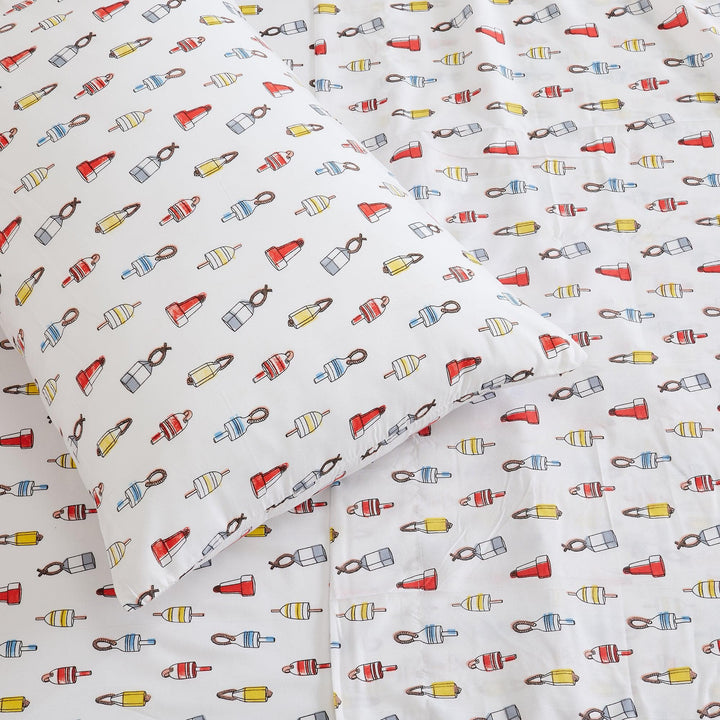 Sheet set with colorful bottle pattern on a white background